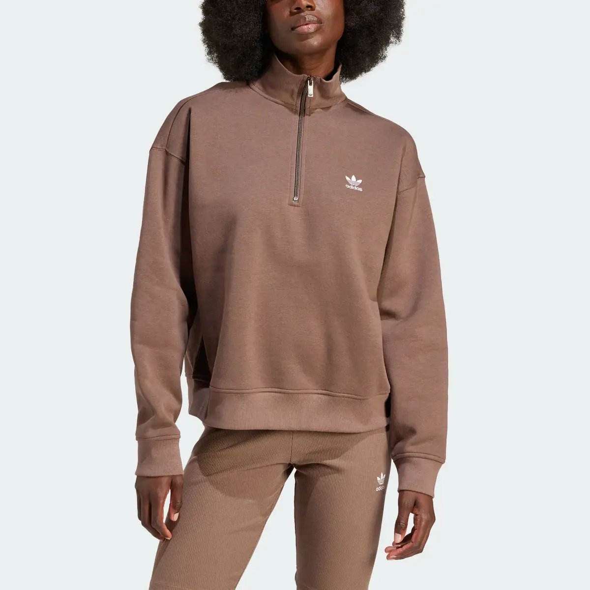 Adidas Essentials 1/2 Zip Sweatshirt. 1