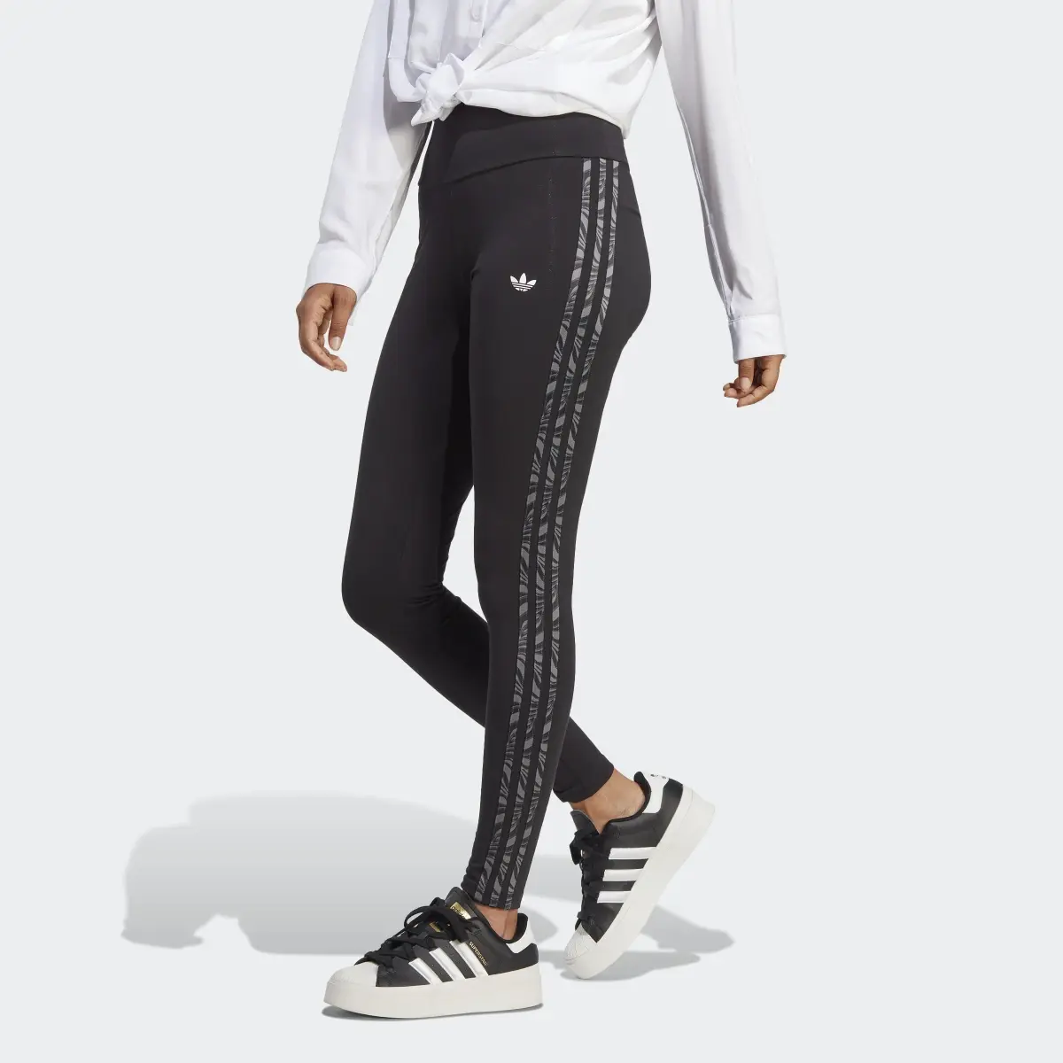 Adidas Abstract Animal Print Leggings. 1