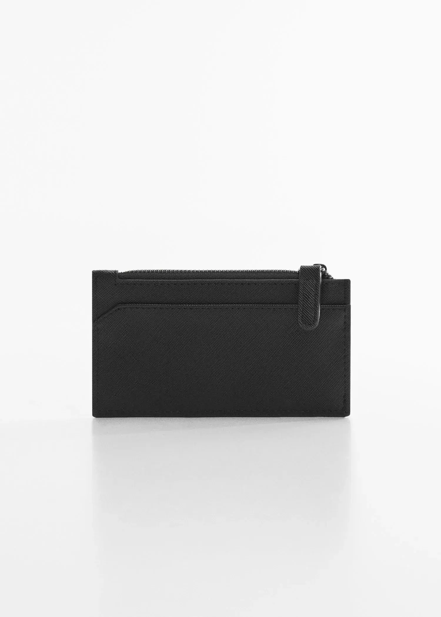 Mango Anti-contactless leather-effect card holder. a black wallet is sitting on a white surface. 