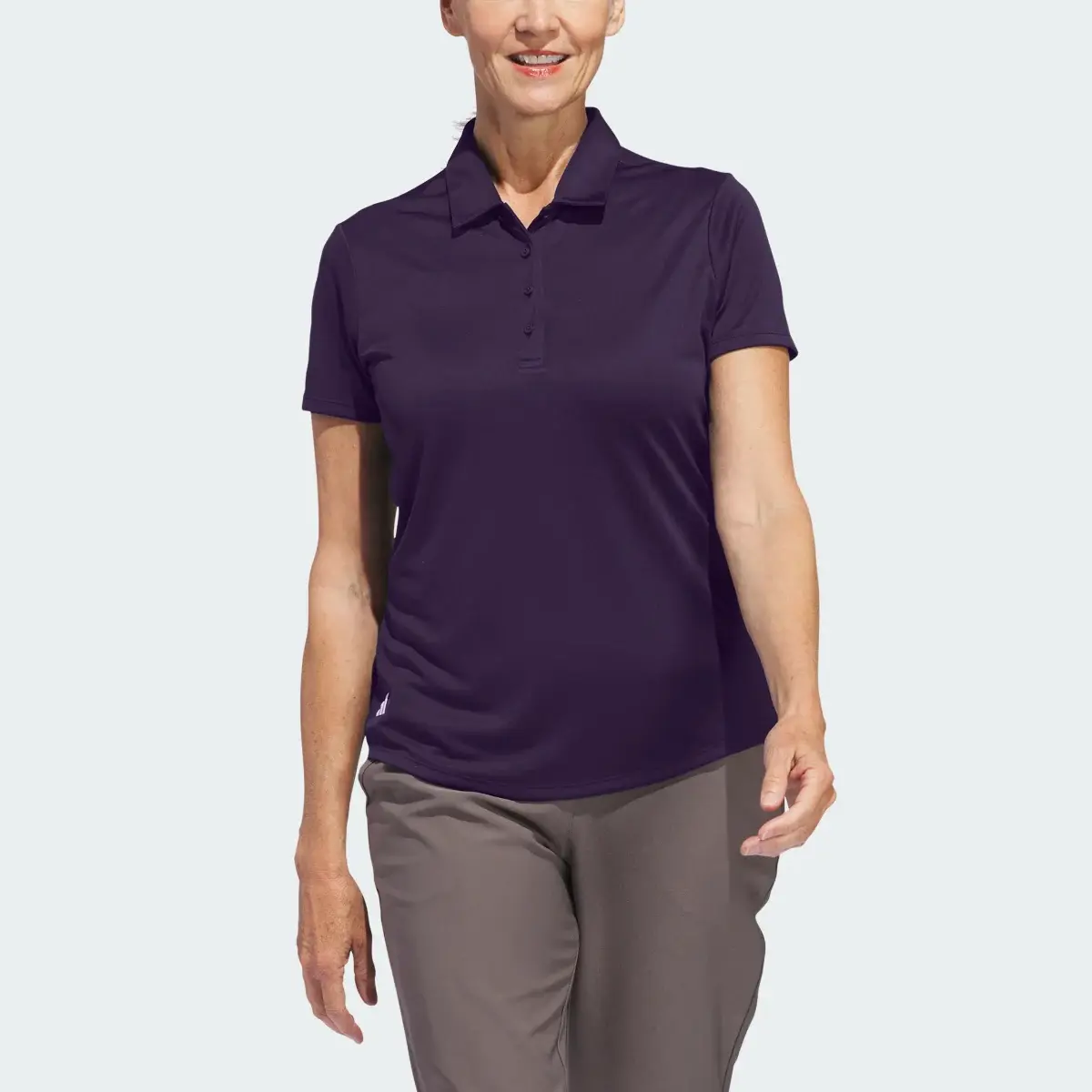 Adidas Women's Solid Performance Short Sleeve Polo Shirt. 1