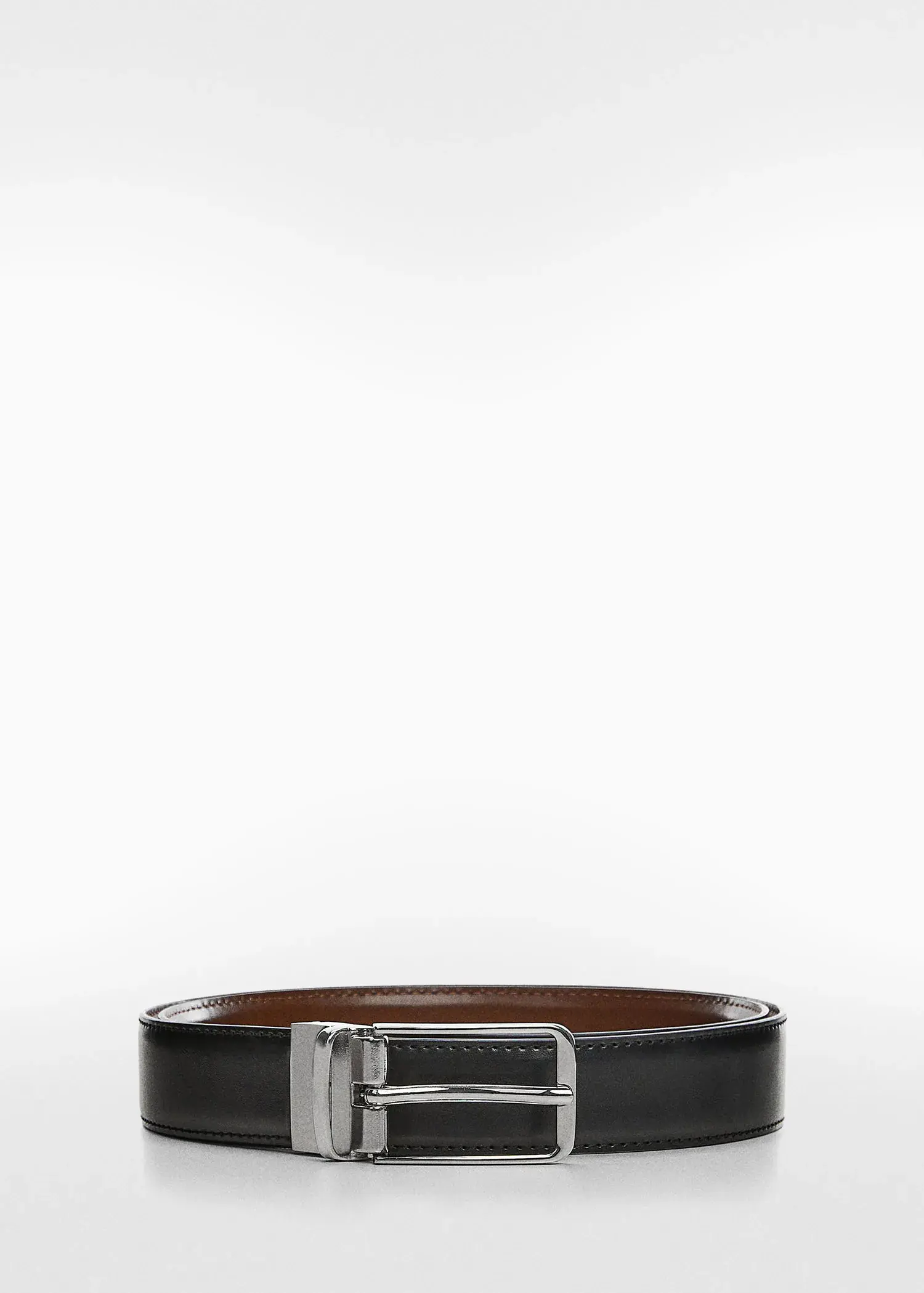 Mango Leather reversible belt. a close up of a belt on a white background 