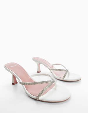Heeled sandal with strass strap