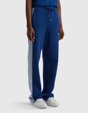 dark blue trousers with sky blue band