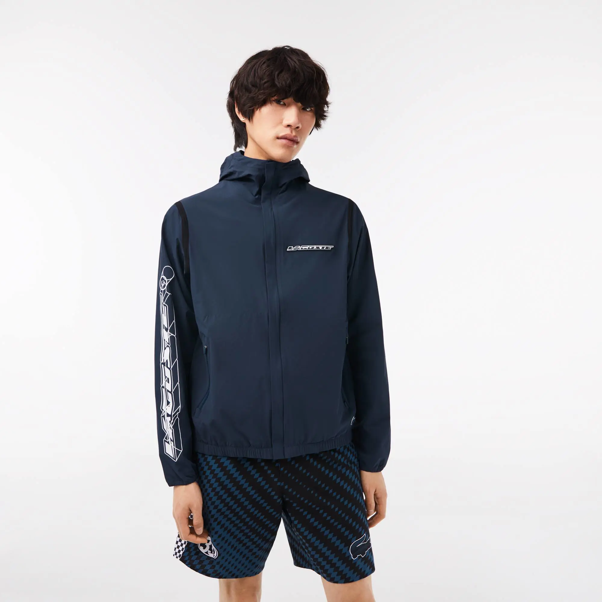 Lacoste Veste courte de survêtement homme Lacoste en polyamide recyclé. 1